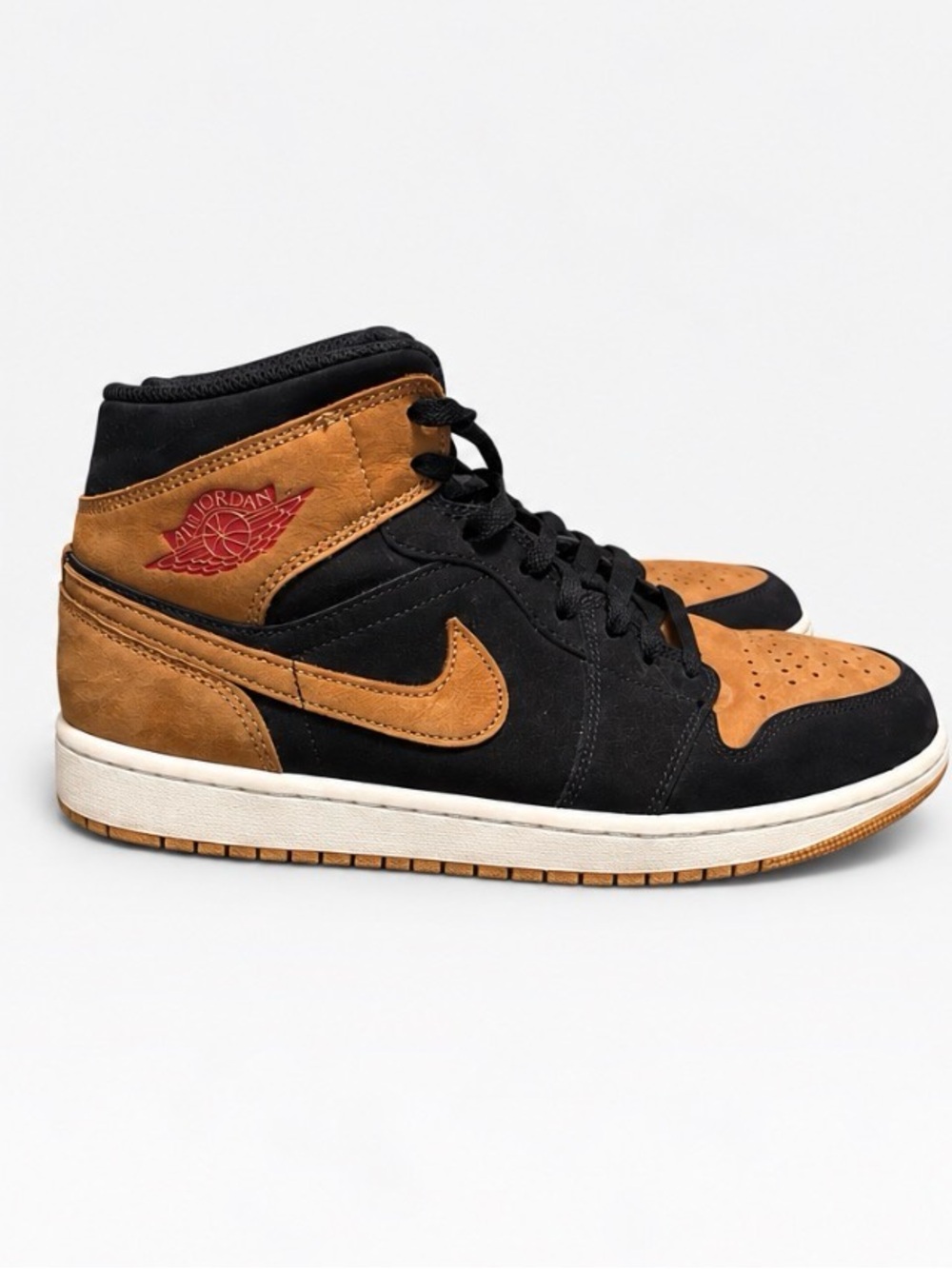 Jordan Retro 1 Black and Tan High-Top Sneakers